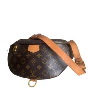 The classic sold out on website Louis Vuitton Brown Monogram Crossbody Bag.